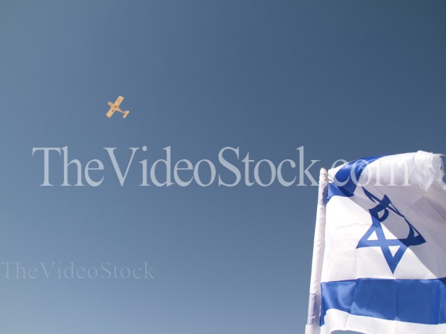 Piper plane over Israel flag Piper plane over Israel flag